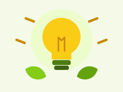 Glowing yellow light bulb with two green leaves