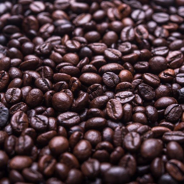Dark roasted coffee beans close up