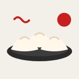 Three steamed dumplings on a dark plate