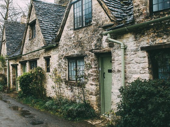 Row of old stone houses along a narrow street